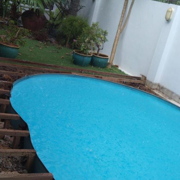 Pool Decking Before 1 Everyday Renovation pool renovation project in Singapore, showing before and after